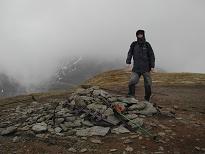 Me at the summit - and a summit cairn to rival Carn na Caim Me at the summit - and a summit cairn to rival Carn na Caim